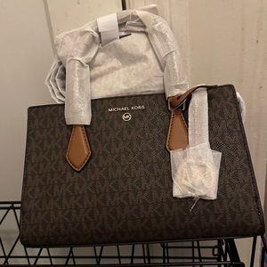 Michael Kors small purse, brown, brand new, still has wrapping and strap as well